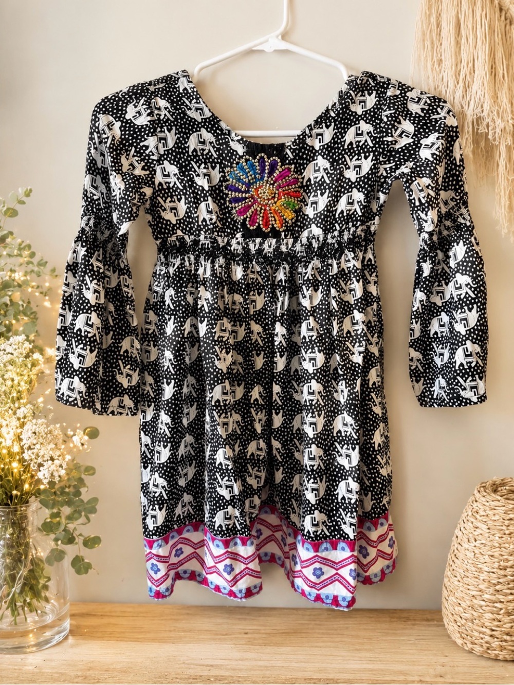 Girls Black & White Elephant Print Dress with Multicolor Flower Accent